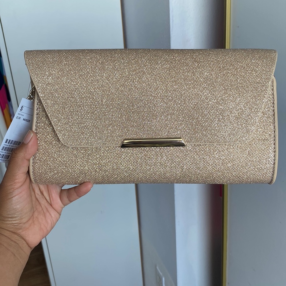 Gold hand bag